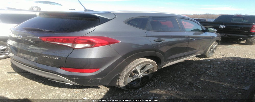 KM8J33A21HU589671 2017 HYUNDAI TUCSON photo no. 4