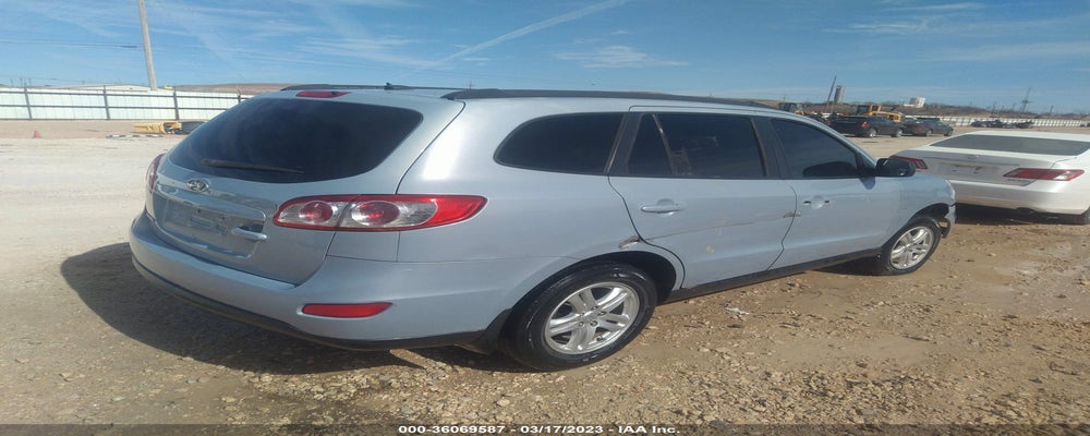 5NMSG3AB7AH386875 2010 HYUNDAI SANTA FE photo no. 4