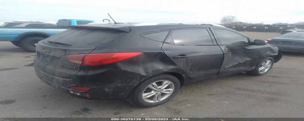 KM8JU3AC9DU752017 2013 HYUNDAI TUCSON photo no. 4