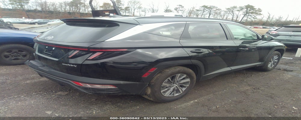 KM8JBCA13NU066576 2022 HYUNDAI TUCSON HYBRID photo no. 4
