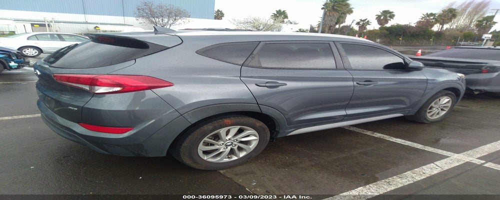 KM8J3CA49JU597119 2018 HYUNDAI TUCSON photo no. 4