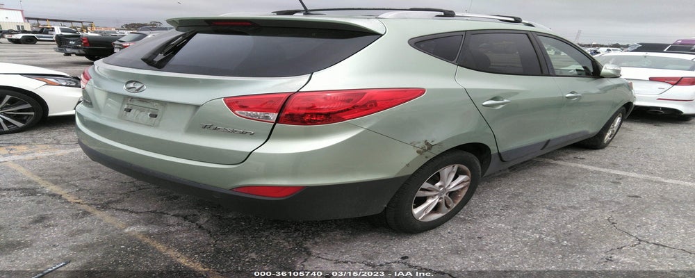 KM8JU3AC5CU393151 2012 HYUNDAI TUCSON photo no. 4
