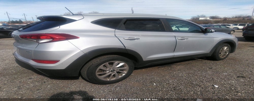 KM8J3CA46GU143791 2016 HYUNDAI TUCSON photo no. 4