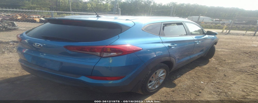 KM8J33A44GU106464 2016 HYUNDAI TUCSON photo no. 4
