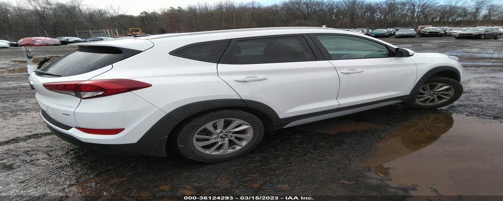 KM8J3CA42HU418607 2017 HYUNDAI TUCSON photo no. 4