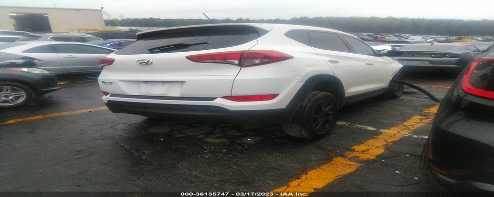 KM8J23A49HU283032 2017 HYUNDAI TUCSON photo no. 4
