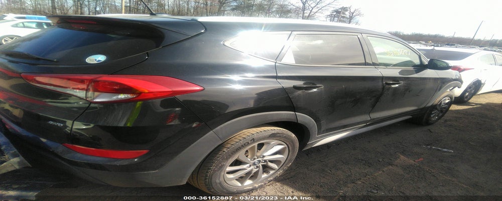 KM8J3CA42HU474594 2017 HYUNDAI TUCSON photo no. 4