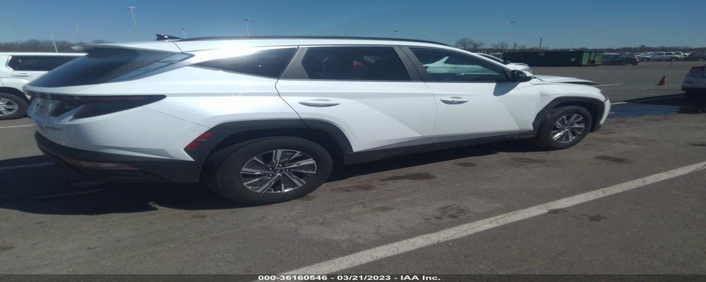 KM8JBCA14NU016821 2022 HYUNDAI TUCSON HYBRID photo no. 4