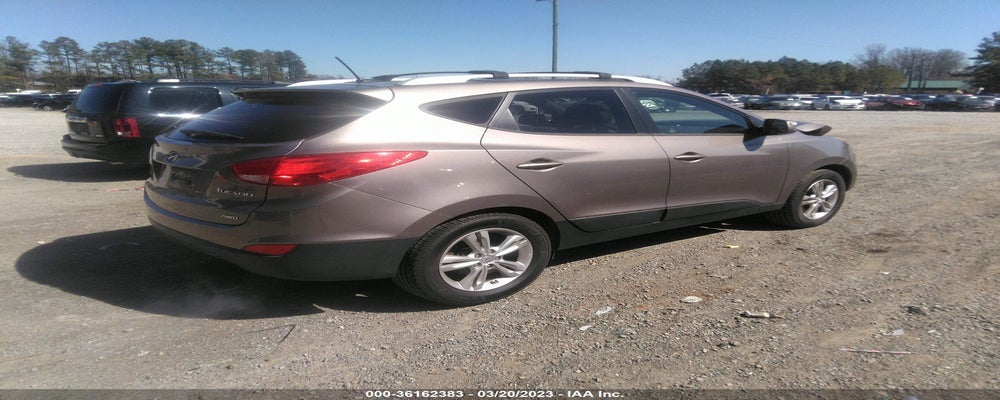 KM8JUCAC1CU446508 2012 HYUNDAI TUCSON photo no. 4