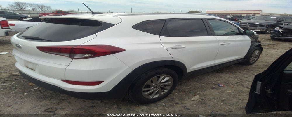 KM8J33A43GU074123 2016 HYUNDAI TUCSON photo no. 4