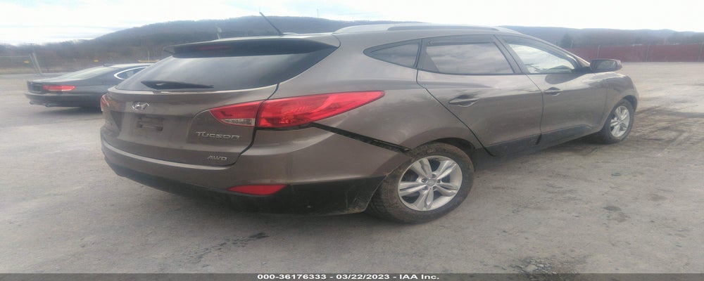 KM8JUCAC2BU313352 2011 HYUNDAI TUCSON photo no. 4