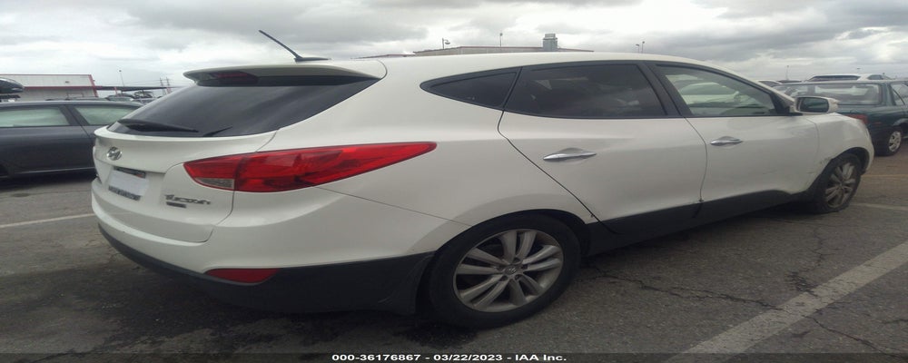 KM8JU3AC4CU530905 2012 HYUNDAI TUCSON photo no. 4