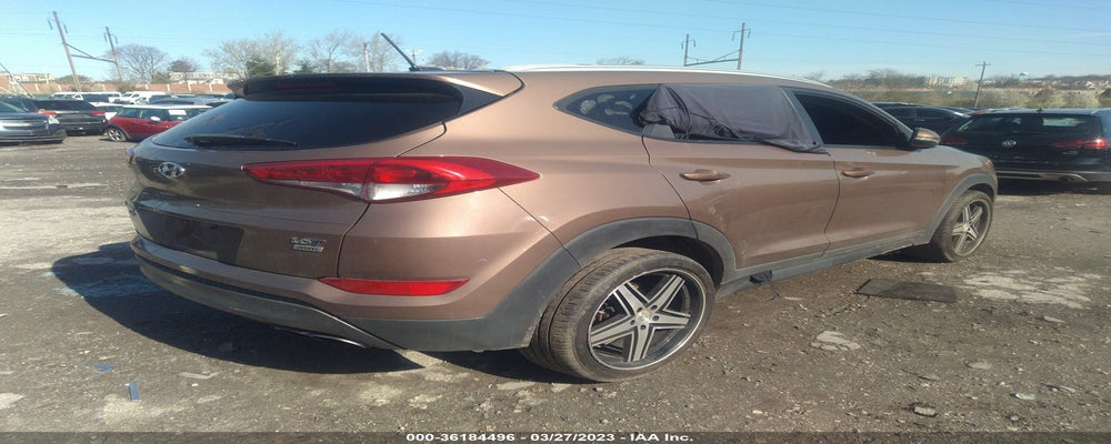 KM8J3CA25GU177638 2016 HYUNDAI TUCSON photo no. 4