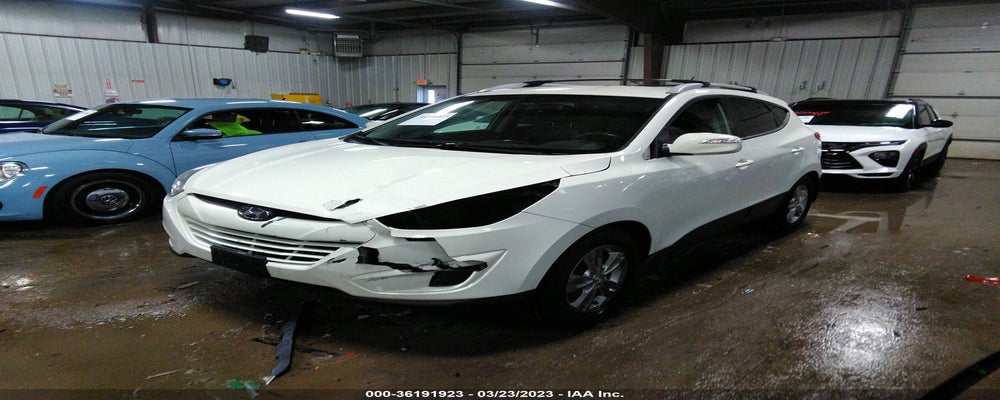 KM8JUCAC8CU396870 2012 HYUNDAI TUCSON photo no. 2