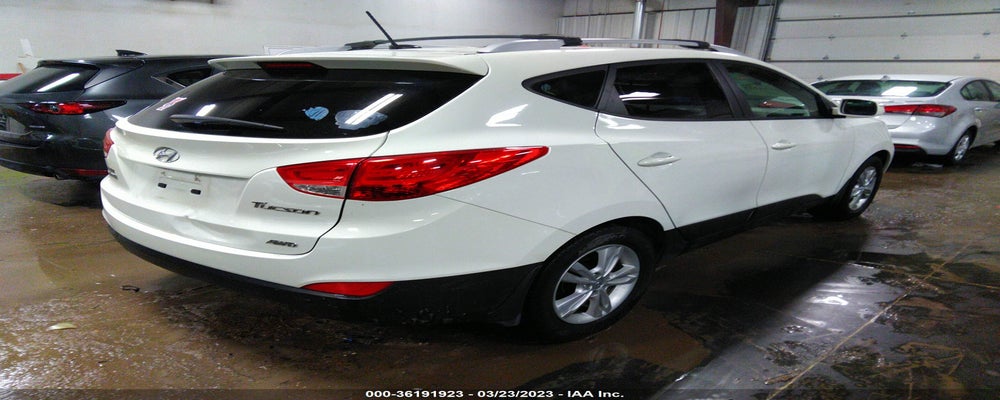 KM8JUCAC8CU396870 2012 HYUNDAI TUCSON photo no. 4