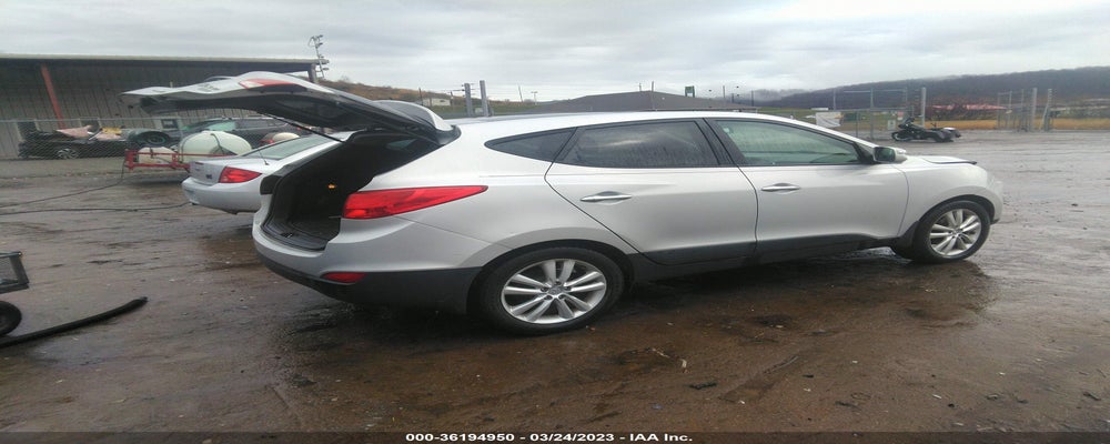 KM8JUCAC6CU505407 2012 HYUNDAI TUCSON photo no. 4