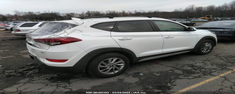 KM8J3CA47HU557616 2017 HYUNDAI TUCSON photo no. 4