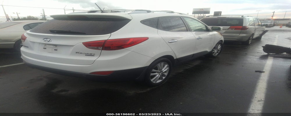 KM8JU3AC6CU527987 2012 HYUNDAI TUCSON photo no. 4