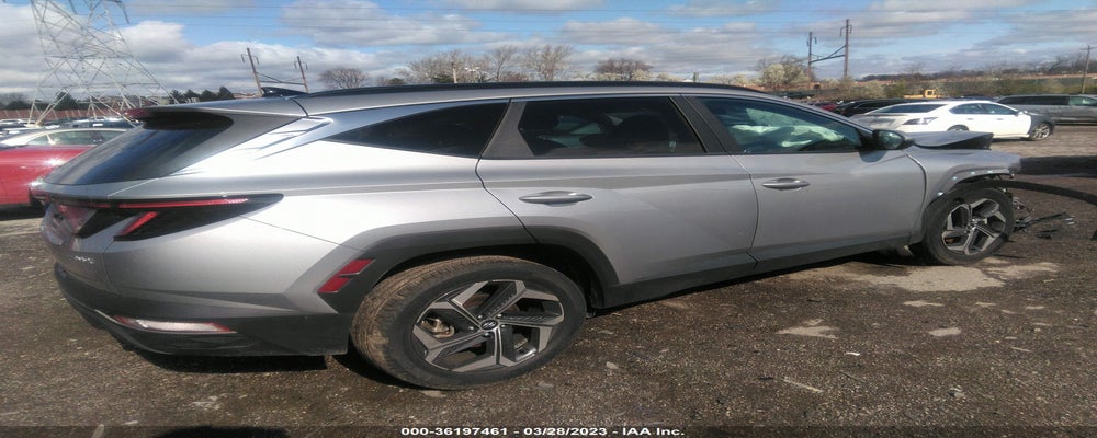 KM8JFCA11NU049277 2022 HYUNDAI TUCSON HYBRID photo no. 4