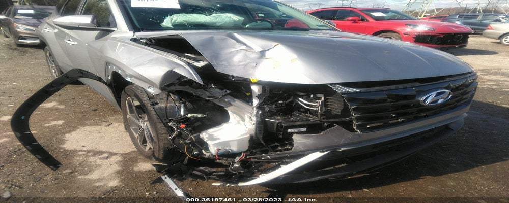 KM8JFCA11NU049277 2022 HYUNDAI TUCSON HYBRID photo no. 6