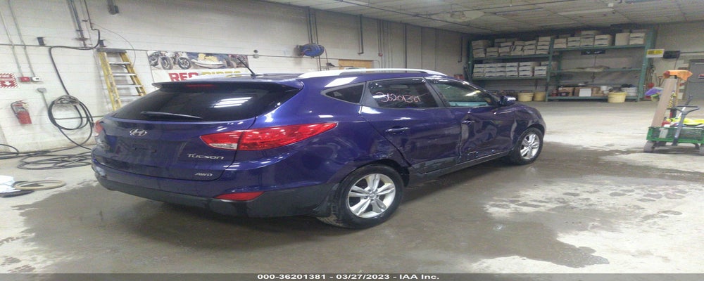 KM8JUCAC0DU558301 2013 HYUNDAI TUCSON photo no. 4