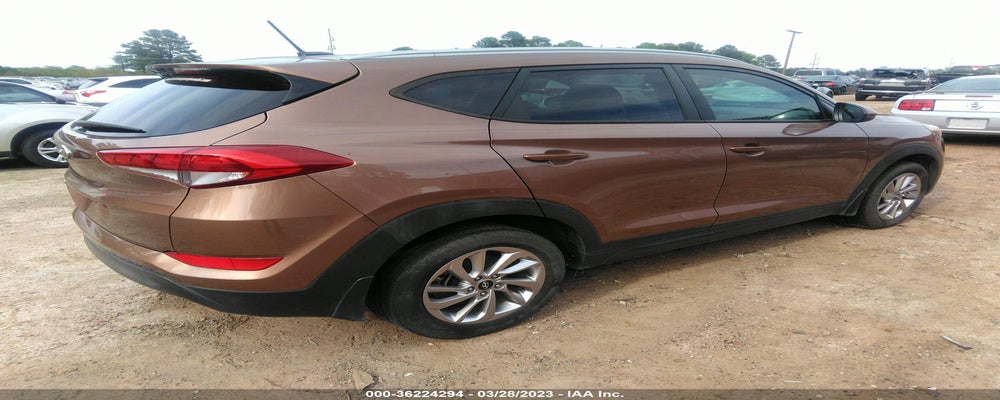 KM8J33A47GU160566 2016 HYUNDAI TUCSON photo no. 4