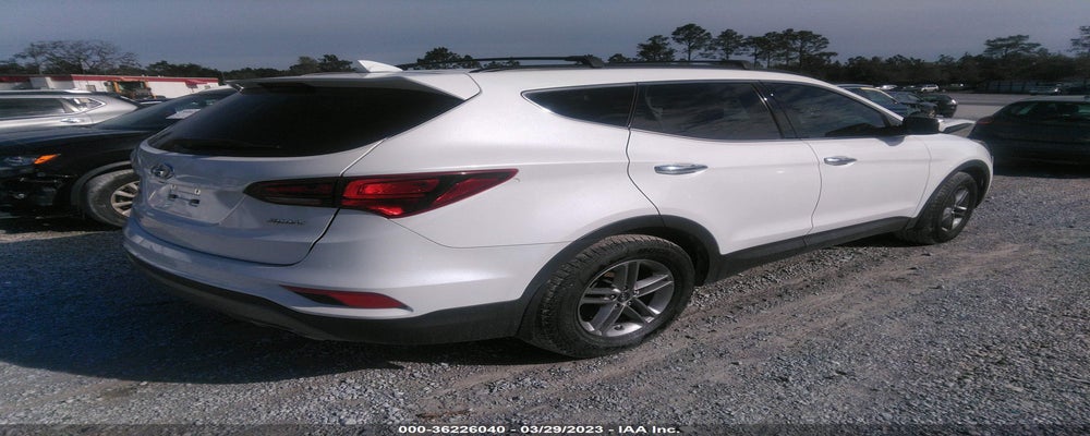5NMZU3LB8JH064654 2018 HYUNDAI SANTA FE SPORT photo no. 4