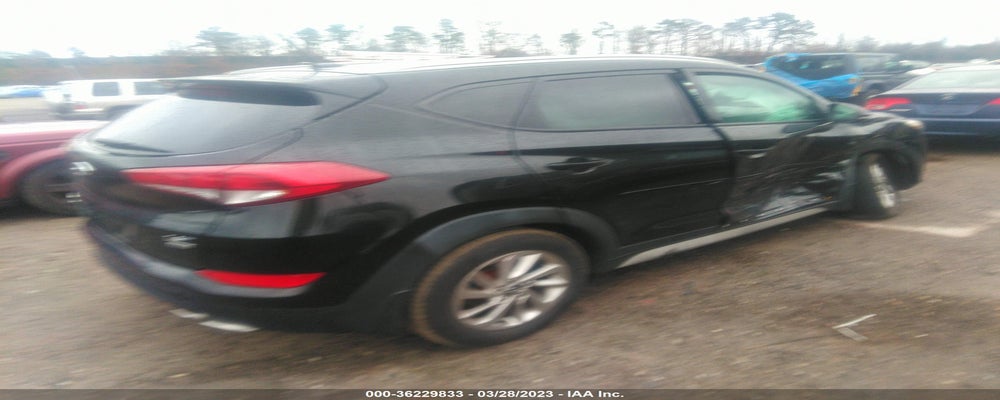 KM8J3CA26HU351816 2017 HYUNDAI TUCSON photo no. 4