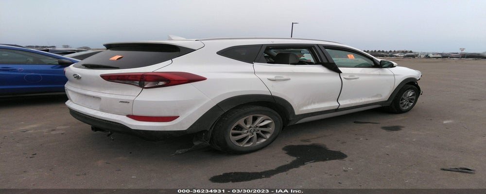 KM8J3CA49JU609074 2018 HYUNDAI TUCSON photo no. 4