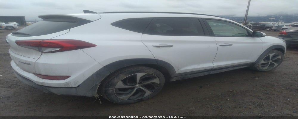 KM8J3CA27GU185708 2016 HYUNDAI TUCSON photo no. 4
