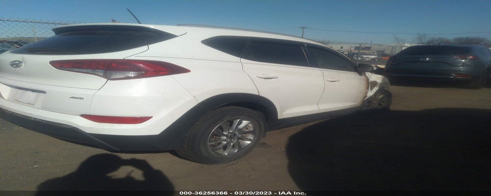 KM8J3CA43GU249633 2016 HYUNDAI TUCSON photo no. 4