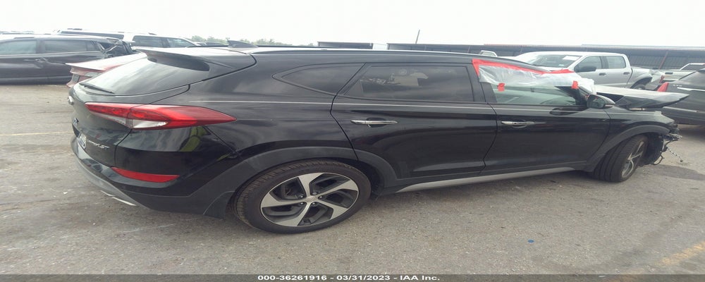 KM8J33A23HU315579 2017 HYUNDAI TUCSON photo no. 4