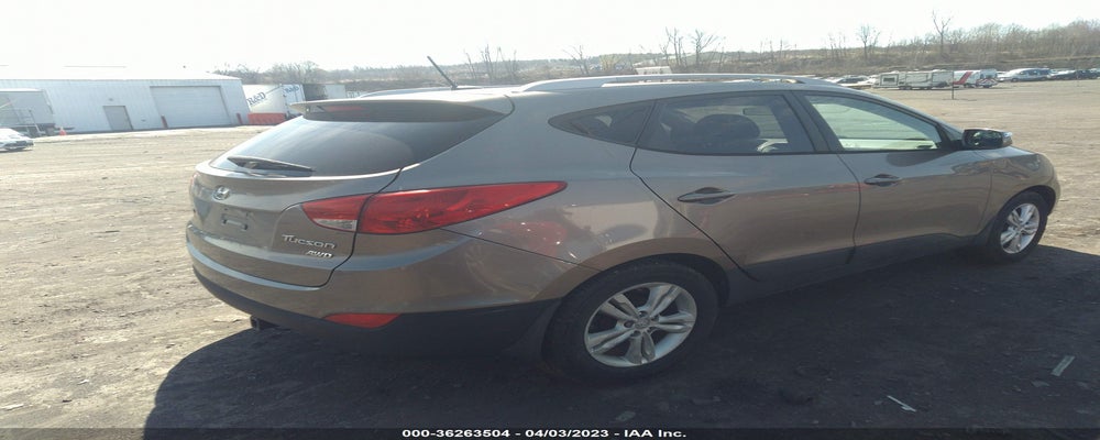 KM8JUCAC0CU347033 2012 HYUNDAI TUCSON photo no. 4