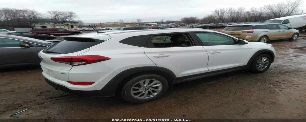 KM8J3CA48GU222122 2016 HYUNDAI TUCSON photo no. 4
