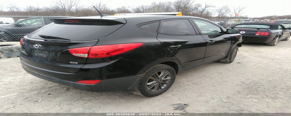 KM8JTCAF6EU857127 2014 HYUNDAI TUCSON photo no. 4