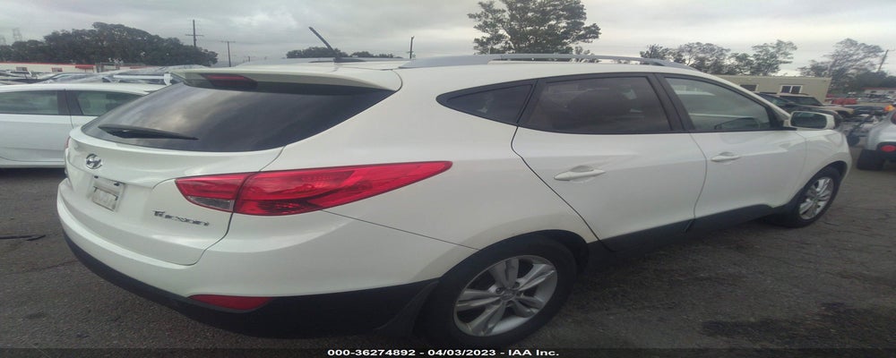 KM8JU3AC8BU212039 2011 HYUNDAI TUCSON photo no. 4