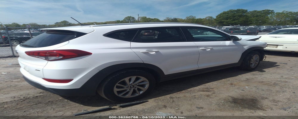 KM8J3CA45GU106019 2016 HYUNDAI TUCSON photo no. 4