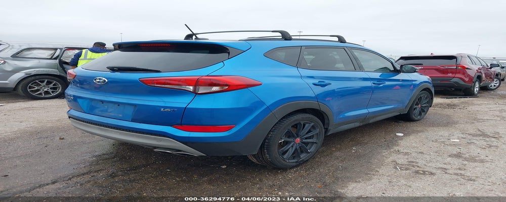 KM8J33A22HU470754 2017 HYUNDAI TUCSON photo no. 4