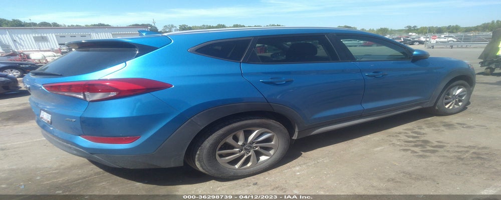 KM8J3CA47JU718004 2018 HYUNDAI TUCSON photo no. 4