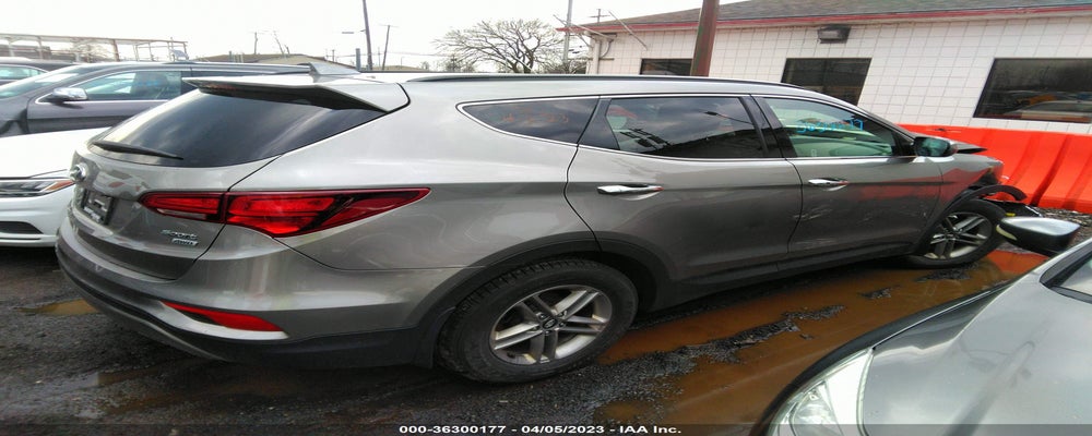 5XYZUDLB0JG519450 2018 HYUNDAI SANTA FE SPORT photo no. 4