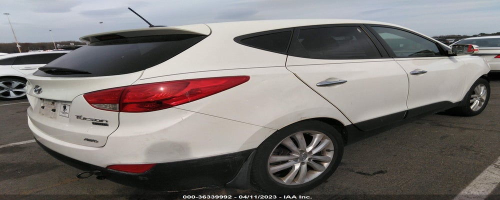KM8JUCAC3CU537697 2012 HYUNDAI TUCSON photo no. 4
