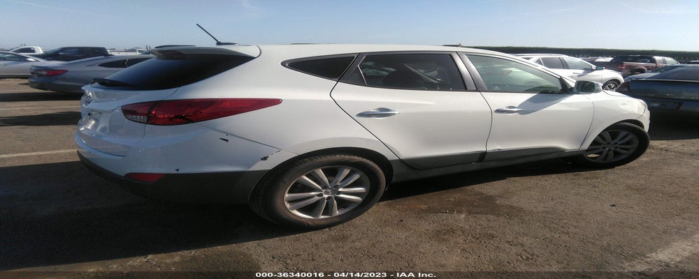 KM8JU3AC6CU467726 2012 HYUNDAI TUCSON photo no. 4