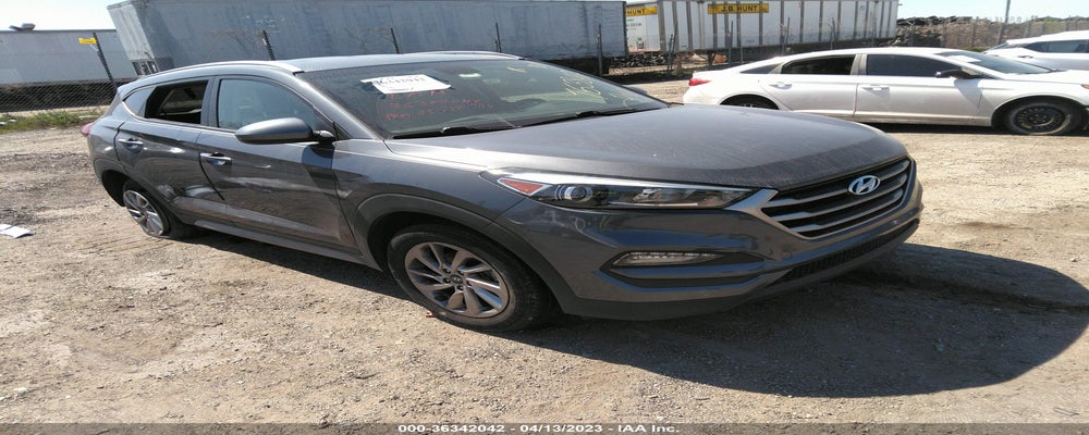 KM8J3CA42JU753842 2018 HYUNDAI TUCSON photo no. 4