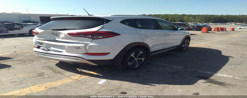 KM8J3CA27HU379429 2017 HYUNDAI TUCSON photo no. 4