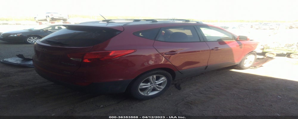 KM8JUCAC3CU397599 2012 HYUNDAI TUCSON photo no. 4