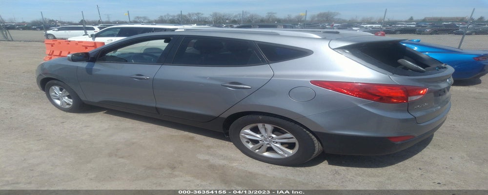 KM8JUCAC0DU711064 2013 HYUNDAI TUCSON photo no. 3