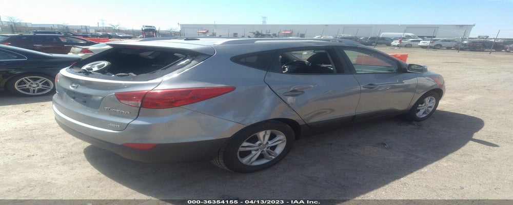 KM8JUCAC0DU711064 2013 HYUNDAI TUCSON photo no. 4