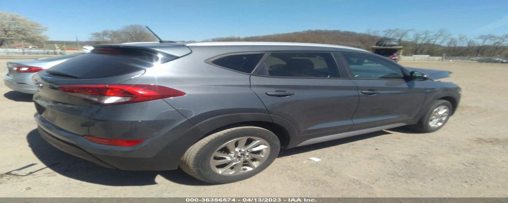 KM8J33A42HU394082 2017 HYUNDAI TUCSON photo no. 4
