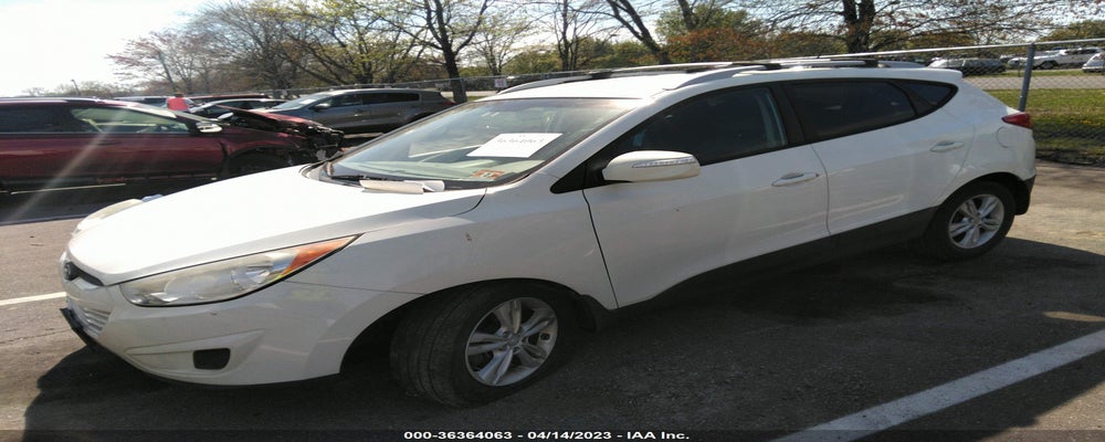KM8JUCAC2CU493532 2012 HYUNDAI TUCSON photo no. 2