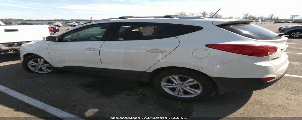 KM8JUCAC2CU493532 2012 HYUNDAI TUCSON photo no. 3